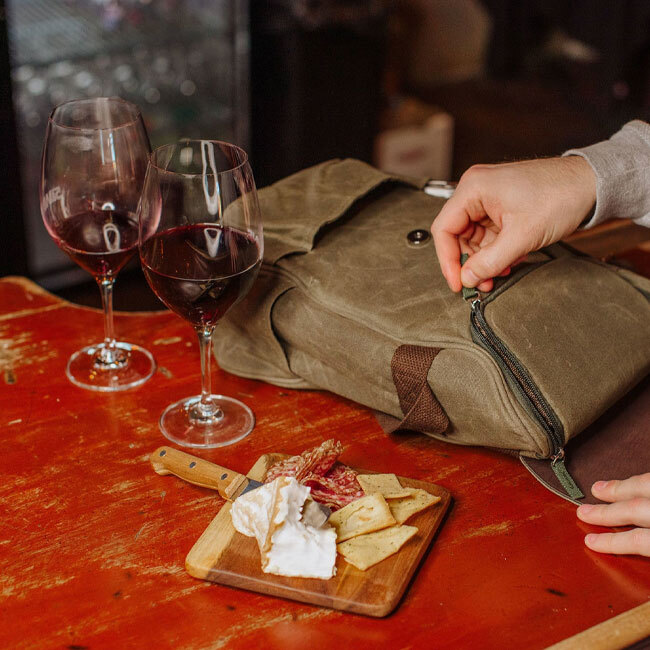 Legacy 2 Bottle Insulated Wine Bag with Cheese Board and Knife Set in use