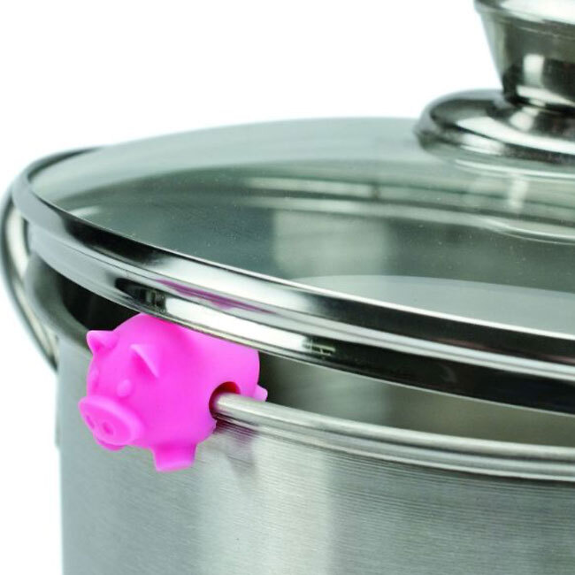 Tovolo Silicone Lid Lifters | Farm Animals | Pink Pig in use