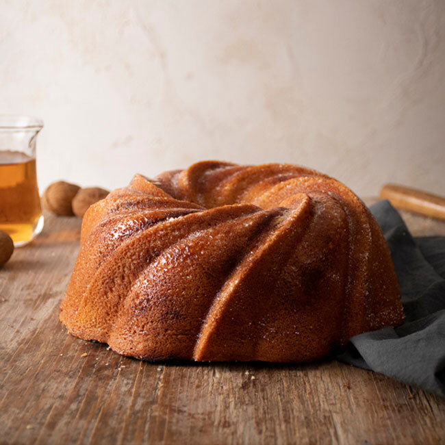 Nordic Ware Swirl Bundt® Pan | Gold - cake