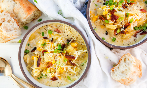 Corn, Leek, and Potato Soup with Green Onions, Cheese, and Crispy Bacon