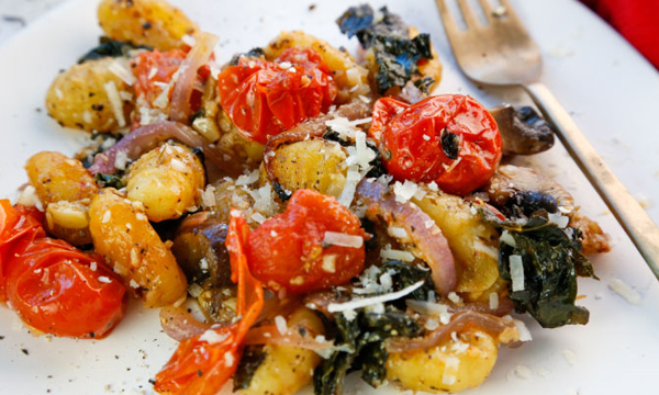 Crispy Sheet Pan Gnocchi with Tomatoes, Mushrooms, and Kale