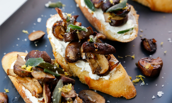 Mushroom and Crispy Sage Crostini served with a Classic Manhattan Cocktail