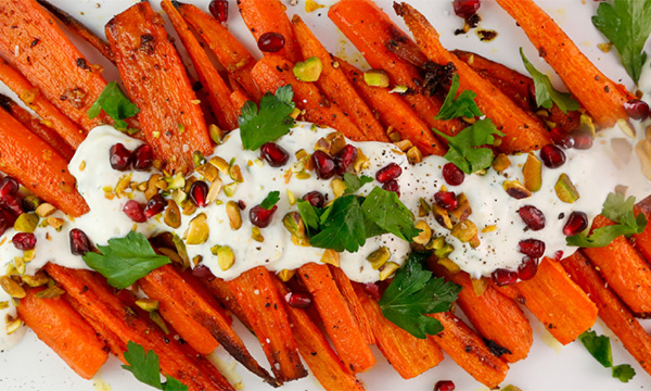 Roasted Carrots with Pistachios, Pomegranate, Parsley, and a Spicy Crema