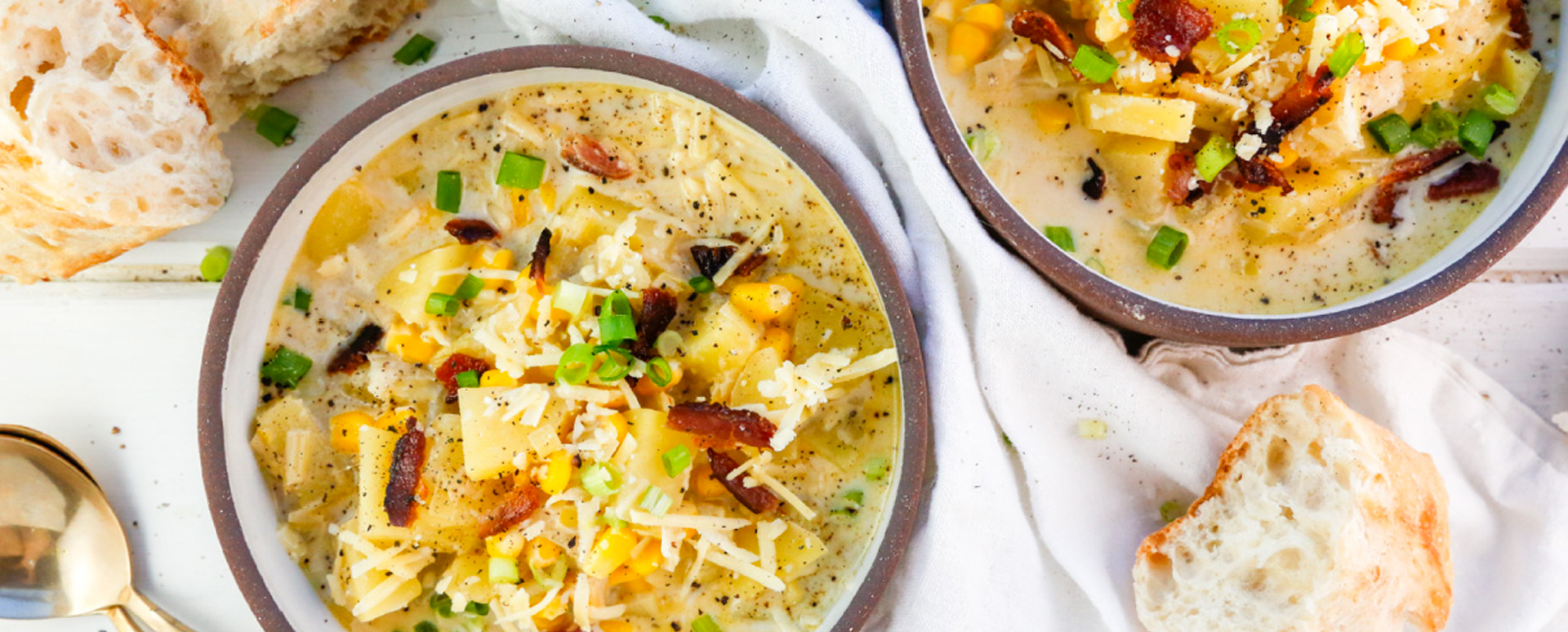 Corn, Leek, and Potato Soup with Green Onions, Cheese, and Crispy Bacon