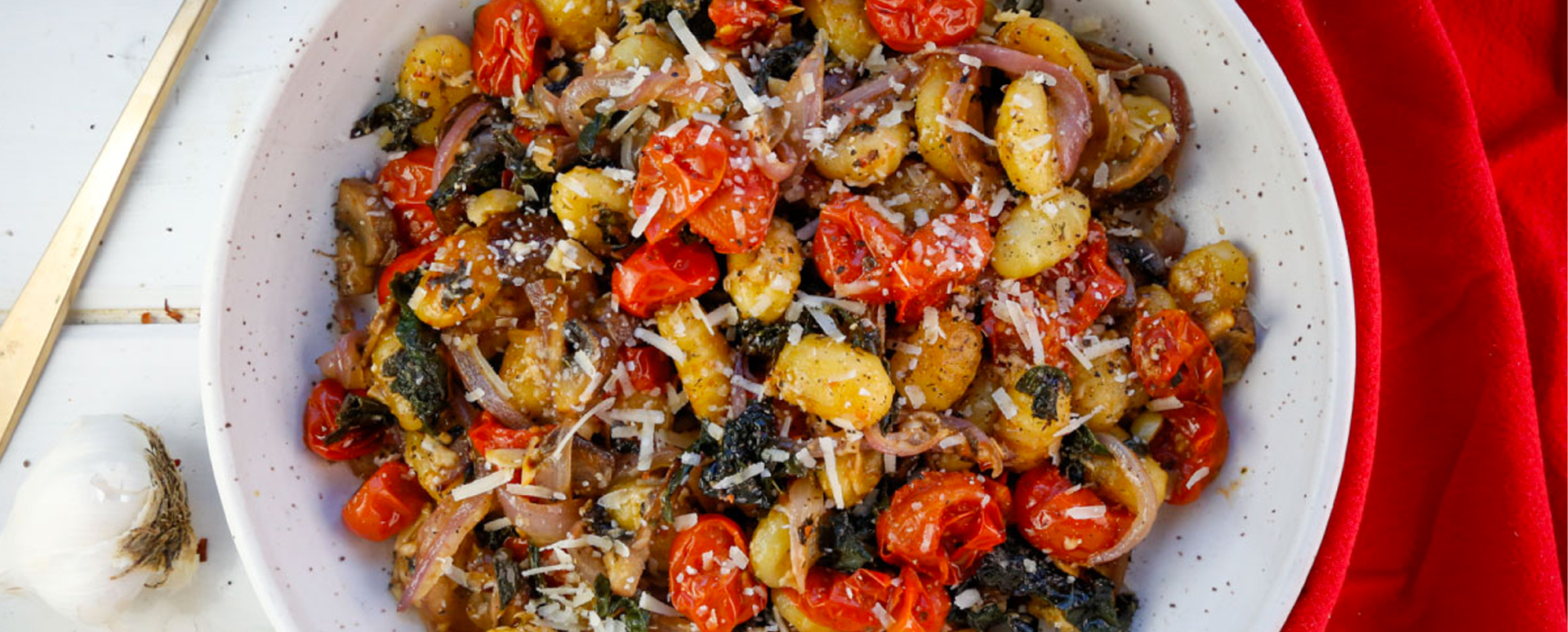 Crispy Sheet Pan Gnocchi with Tomatoes, Mushrooms, and Kale