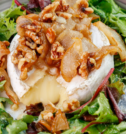 Caramelized Pears with Brie and Walnuts over Mixed Baby Greens